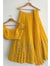 YELLOW COLOR FULLY FLARED LEHENGA CHOLI WITH INTRICATE EMBROIDERY
